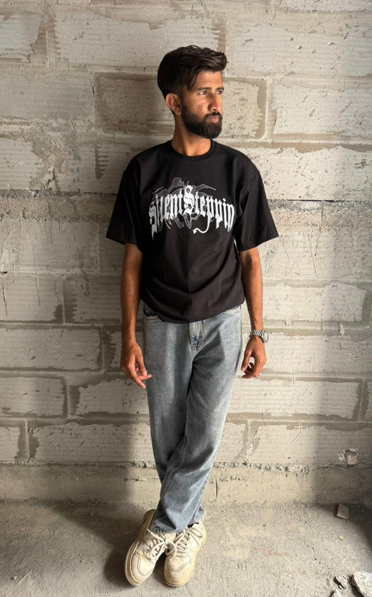 Oversized Black "Spirit Steppin'" T-Shirt with Gothic Winged Cross Back Print - Alternative Streetwear Tee