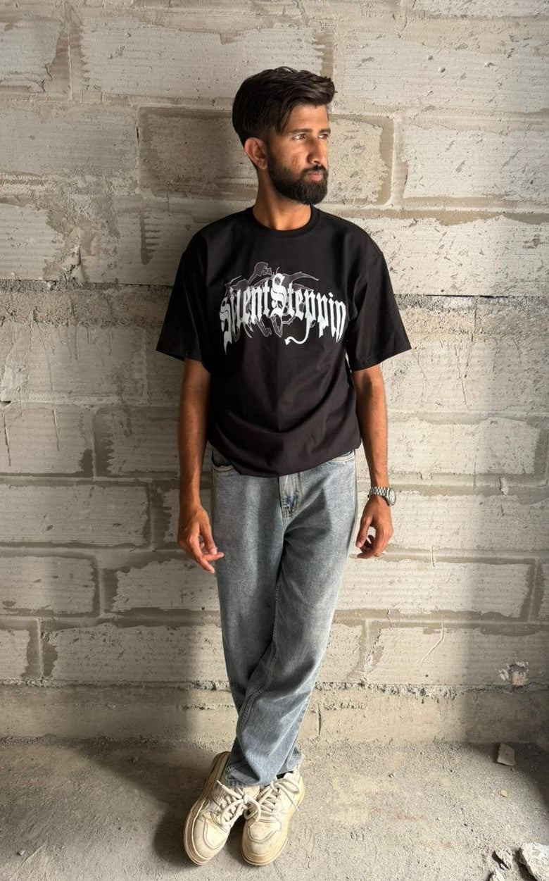 Oversized Black "Spirit Steppin'" T-Shirt with Gothic Winged Cross Back Print - Alternative Streetwear Tee